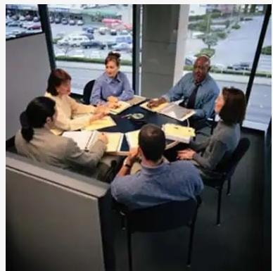 Business coaching team meeting