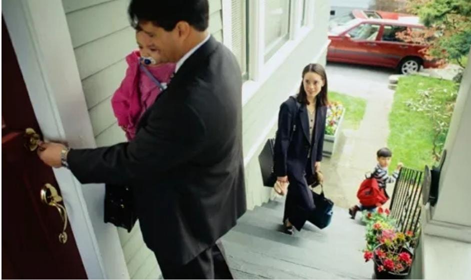 Business professional family leaving home